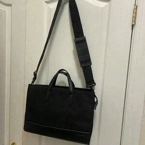 Tumi Ballistic Nylon leather
Briefcase long adjustable padded shoulder straps